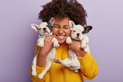 Close,Up,Shot,Of,Pleased,Woman,With,Afro,Hair,Holds