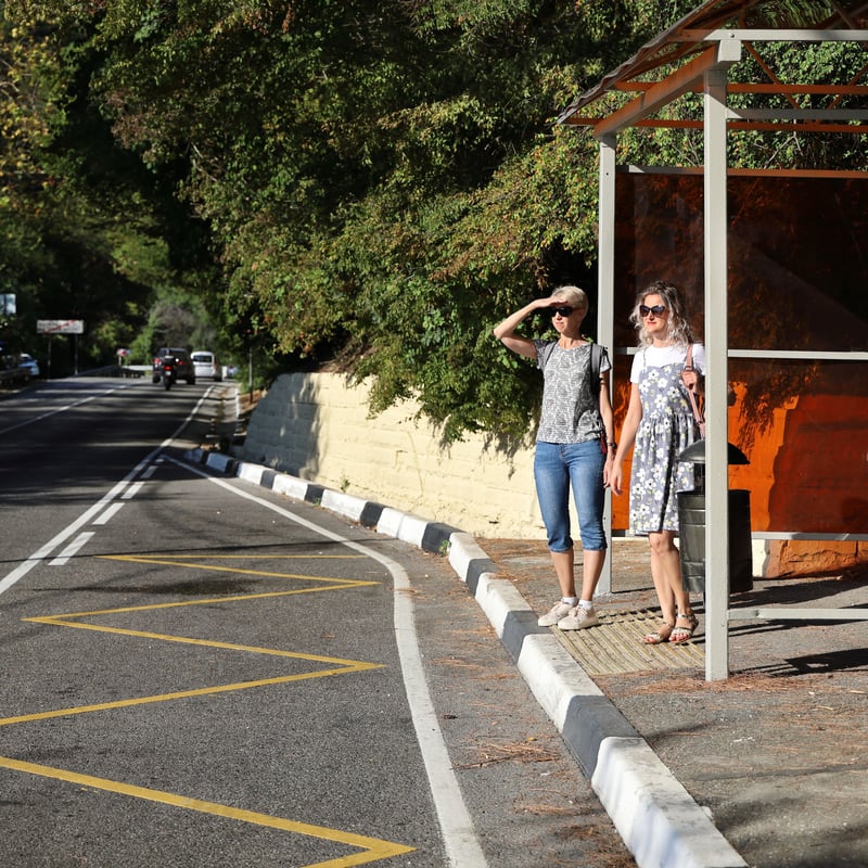 People waiting on a bus station