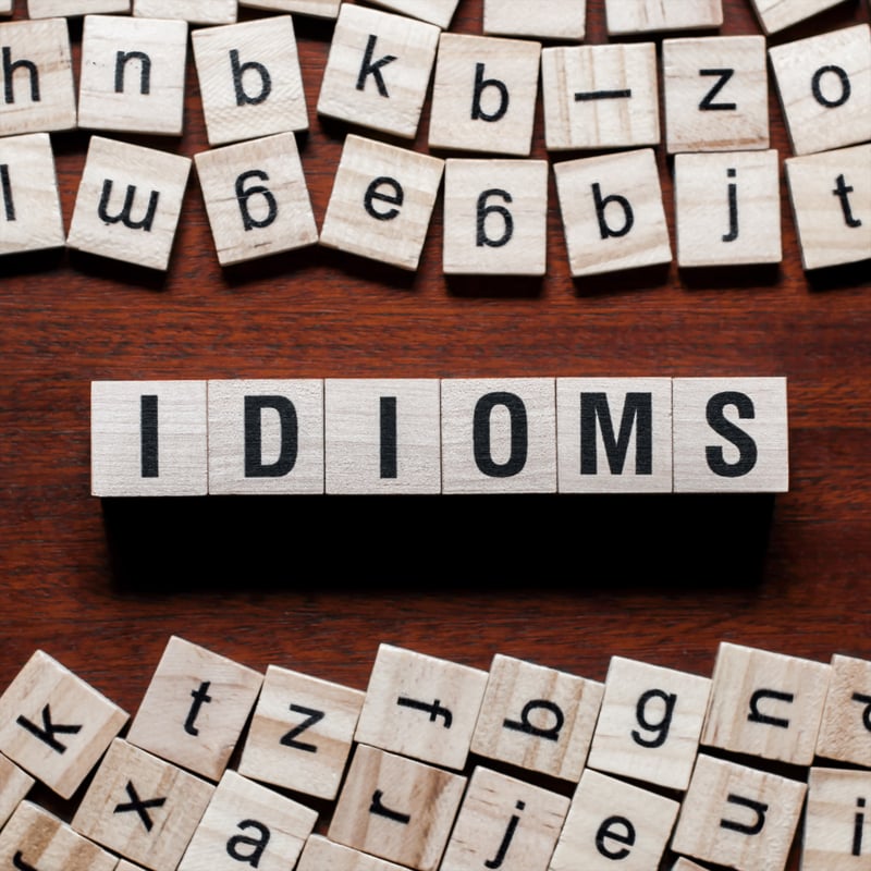 The word Idioms built by wooden blocks